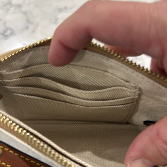 ￼New without tag Dooney and Bourke large wristlet wallet. Creamy white. - Picture 6 of 9